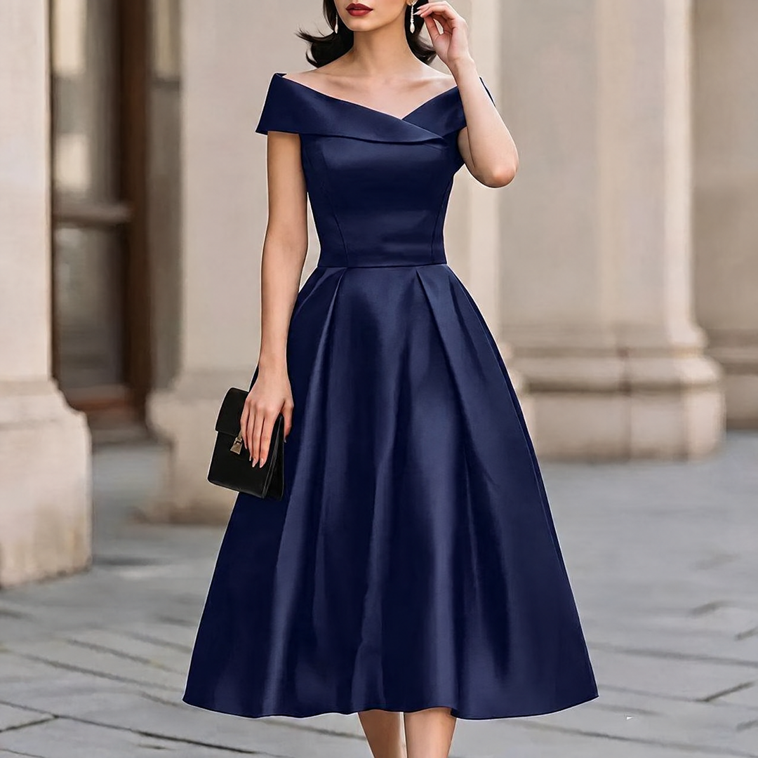 Woman wearing navy off-shoulder A-line midi dress